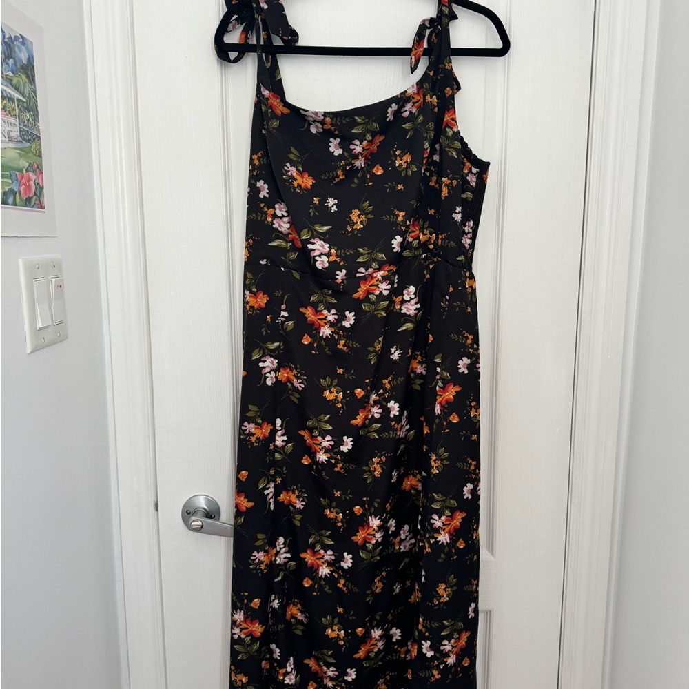 Sleeveless Floral Long Dress with slit.